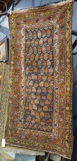 Appraisal: Caucasian rug possibly Karabagh having an all-over boteh design on