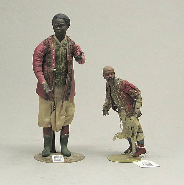 Appraisal: Two Italian polychrome composition and fabric cr che figures th