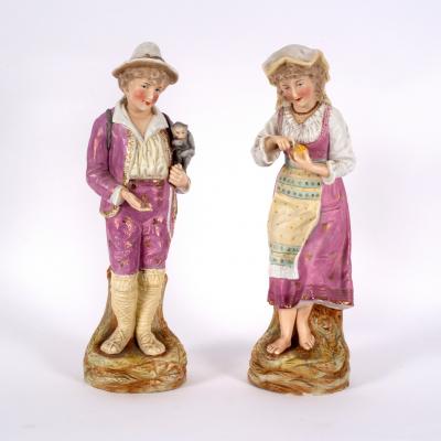 Appraisal: A pair of French biscuit porcelain figures circa she peeling