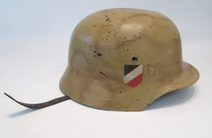 Appraisal: GERMAN WORLD WAR II AFRIKA KORPS HELMET the tan and