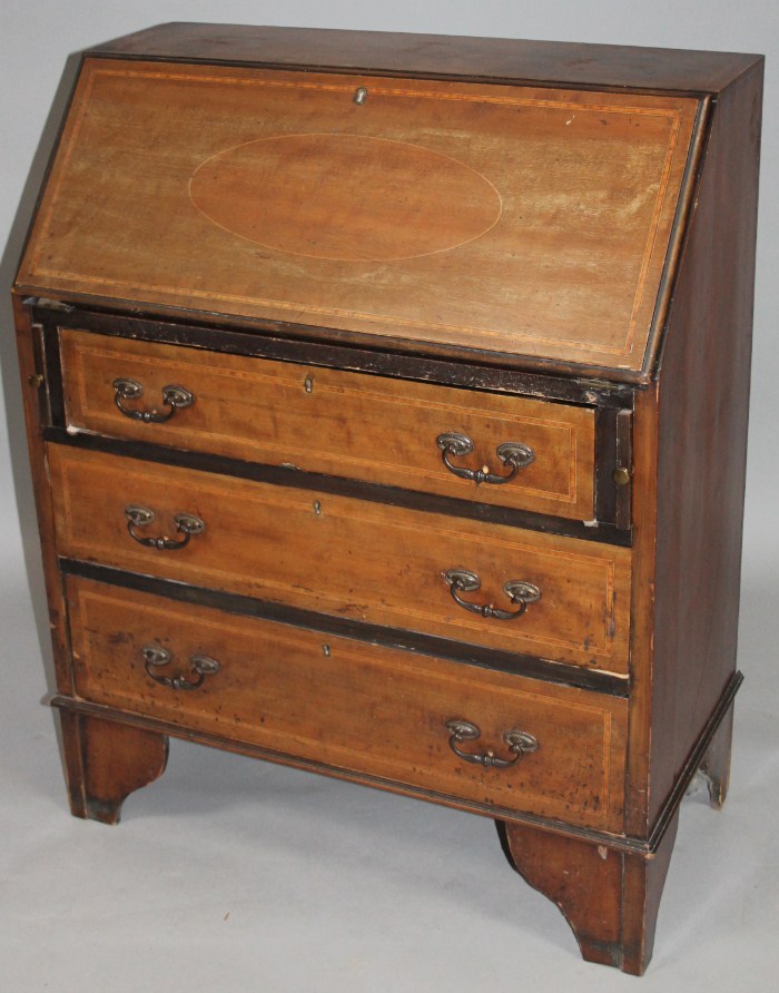 Appraisal: An Edwardian mahogany and boxwood strung bureau the fall front