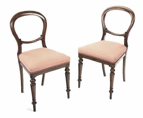 Appraisal: A pair of Victorian balloon back side chairs each with