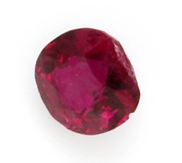 Appraisal: An unmounted ruby the cushion-shaped ruby weighing cts chips