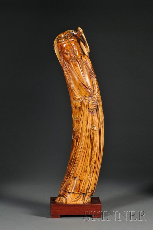 Appraisal: Large Ivory Carving Ming-style early th century standing figure of