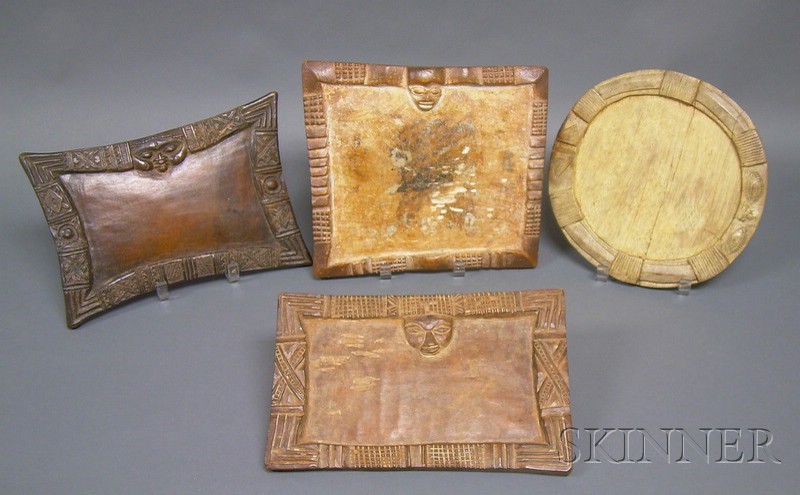 Appraisal: Four African Carved Wood Divination Trays Yoruba three rectangular and