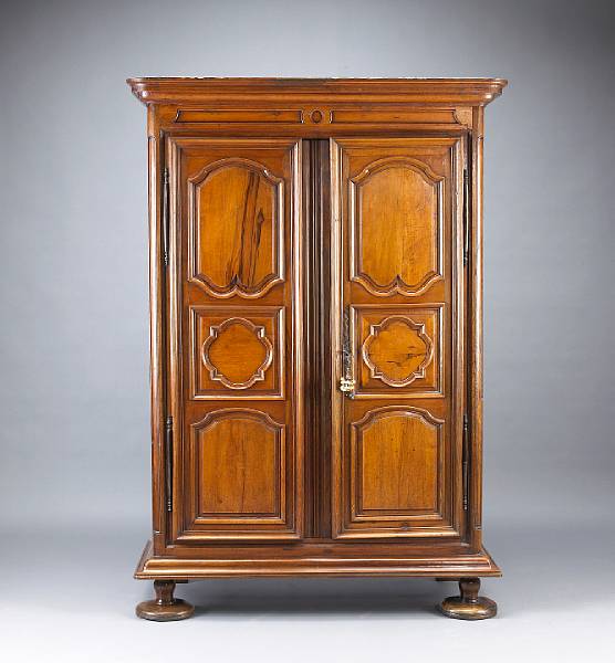 Appraisal: A Louis XIV walnut armoire early th century The outstepped