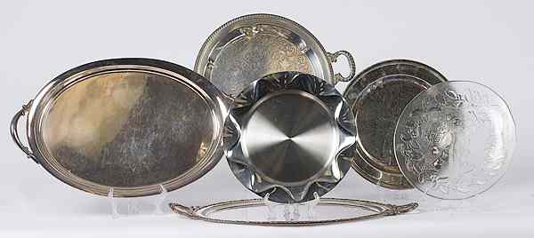 Appraisal: Silverplated Serving Trays Plus American an assembled group of four