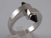 Appraisal: An carat white gold onyx ring by Cartier signed Cartier