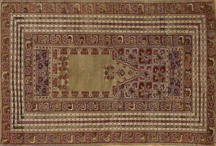 Appraisal: TABRIZ PRAYER RUG The tan field within rose and brown