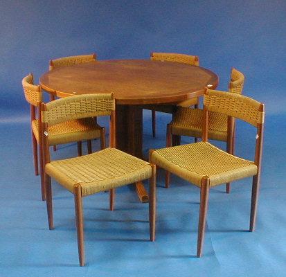 Appraisal: A 's teak dining table and six string upholstered dining