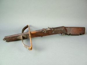 Appraisal: A sporting crossbow with carved walnut tiller and steel furniture