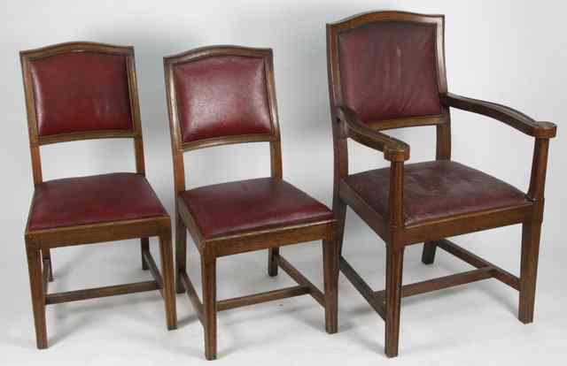 Appraisal: A set of ten oak dining chairs with upholstered seats