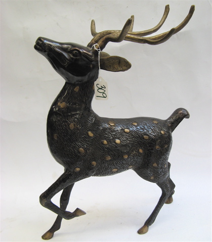 Appraisal: BRONZE SCULPTURE OF A SPOTTED REINDEER golden spots hooves ears