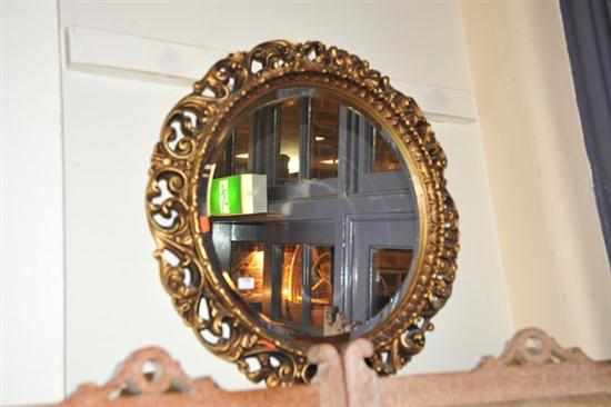 Appraisal: A GILT FRAMED CIRCULAR WALL MIRROR