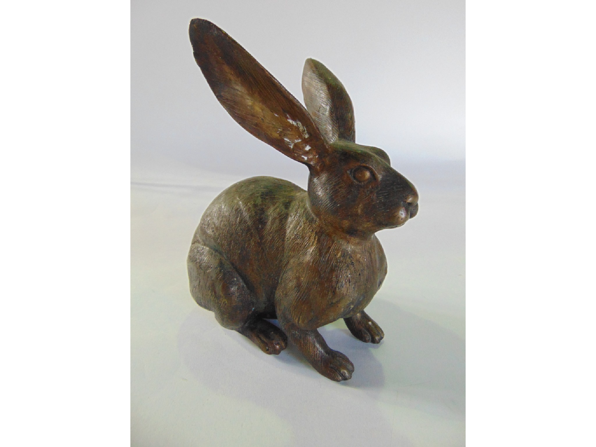 Appraisal: A cast bronze model of a seated hare cm tall