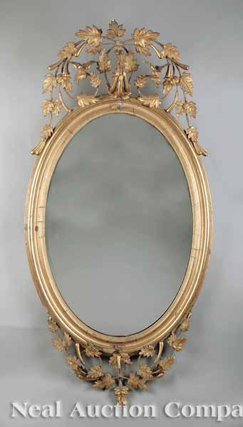 Appraisal: An Antique Louis XVI-Style Giltwood Looking Glass mid- th c