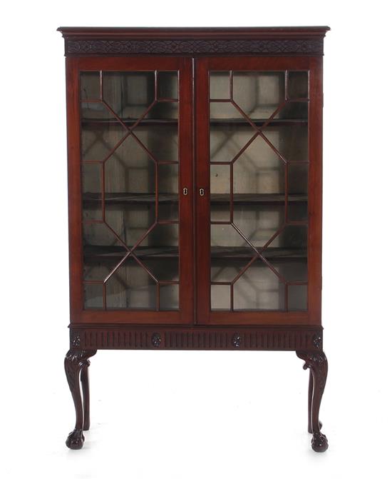 Appraisal: English mahogany bookcase cabinet late th century molded crown blind