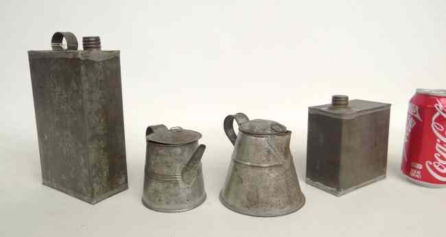 Appraisal: Lot including two early tin coffee pots and two tin