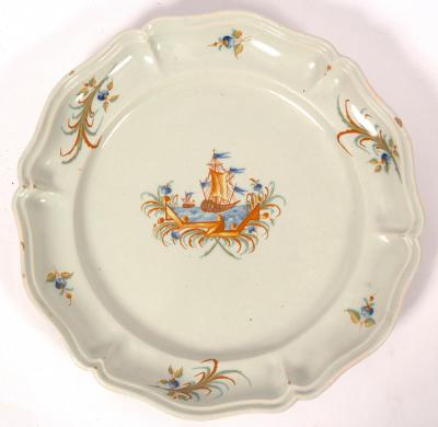 Appraisal: A large Continental faience dish possibly Alcora decorated a vignette