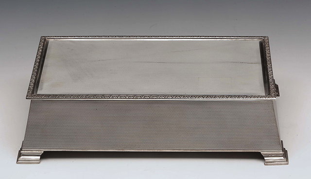 Appraisal: A SILVER CEDAR LINED CIGARETTE BOX rectangular shaped with engine