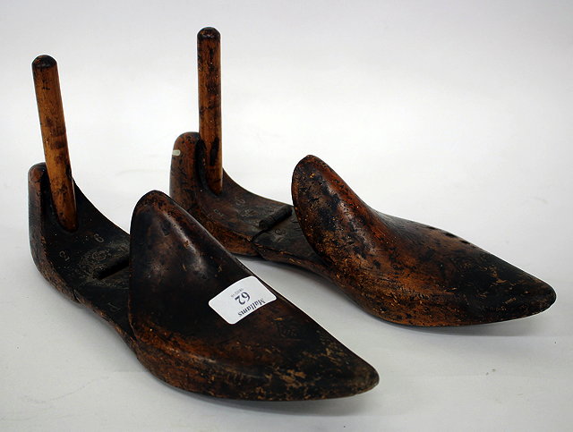 Appraisal: A PAIR OF TH CENTURY TREEN SHOE LASTS each impressed