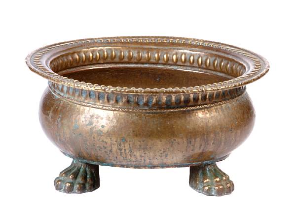 Appraisal: An Italian hammered copper and brass oval planter by Egidio