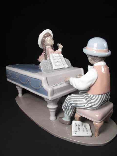 Appraisal: Lladro porcelain figurine titled ''Jazz Duo'' Measures '' tall x