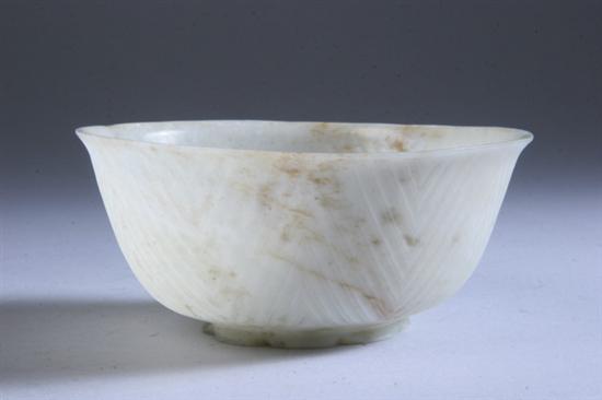 Appraisal: MOGHUL WHITE JADE BOWL On flower base carved with ribbed