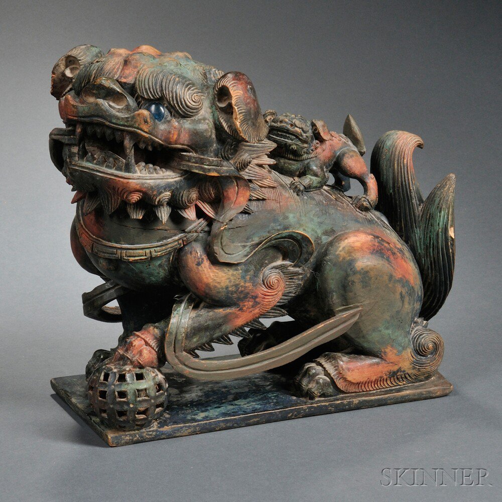 Appraisal: Polychrome Wood Foo Lion China carved seated on its haunches