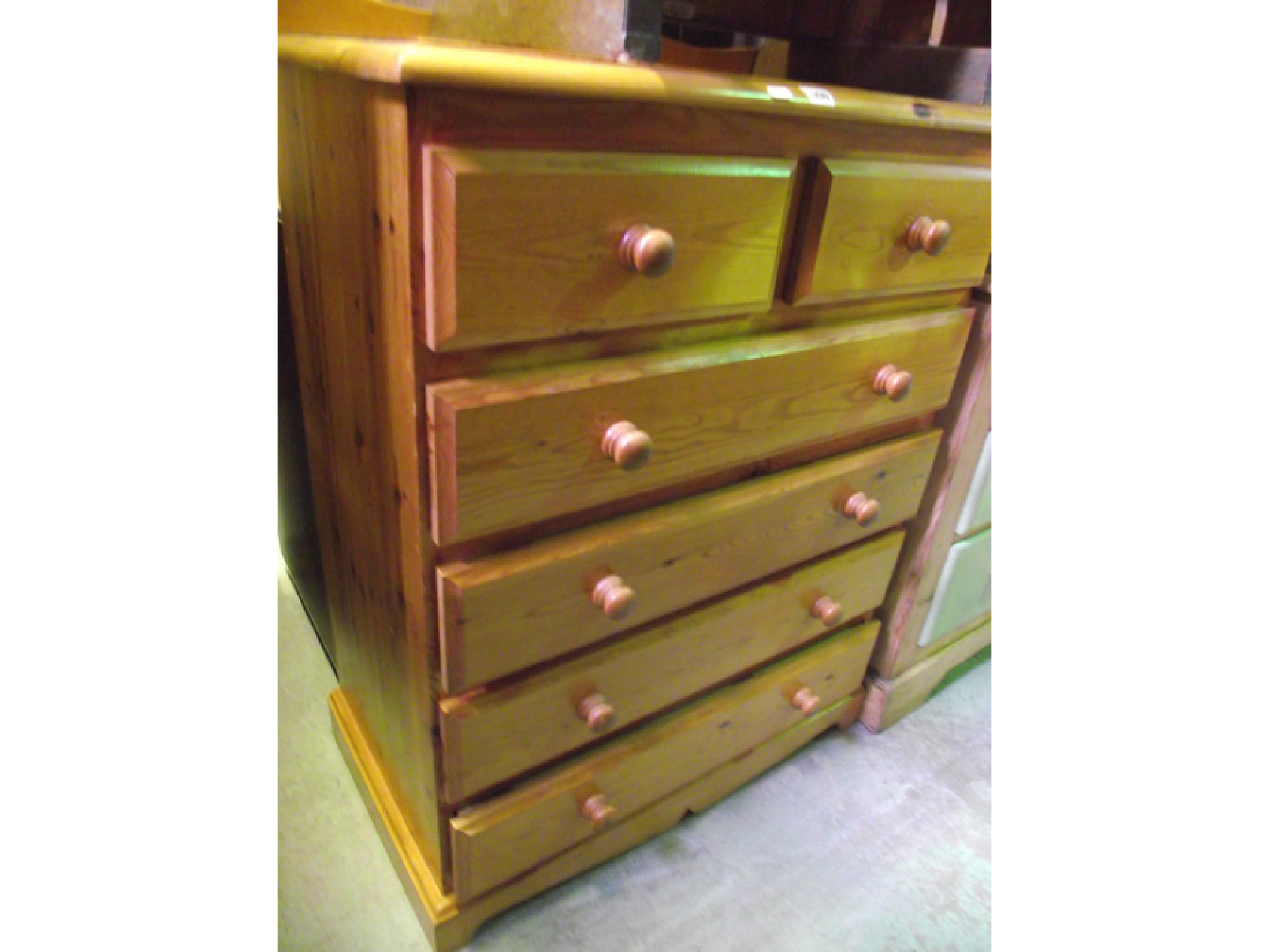 Appraisal: A small modern pine chest with four long and two