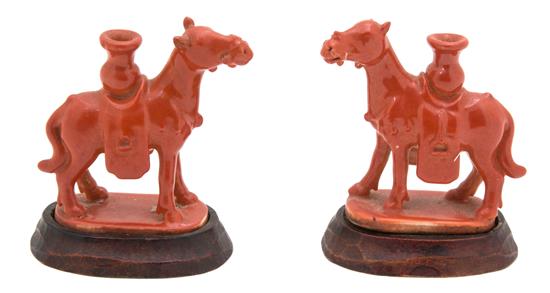 Appraisal: Sale Lot A Pair of Glazed Porcelain Figures of Camels