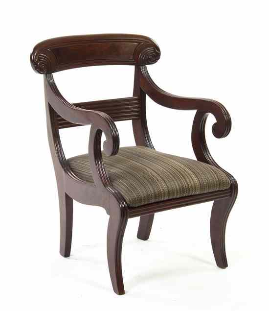 Appraisal: A Regency Style Mahogany Child's Open Armchair having a vertical