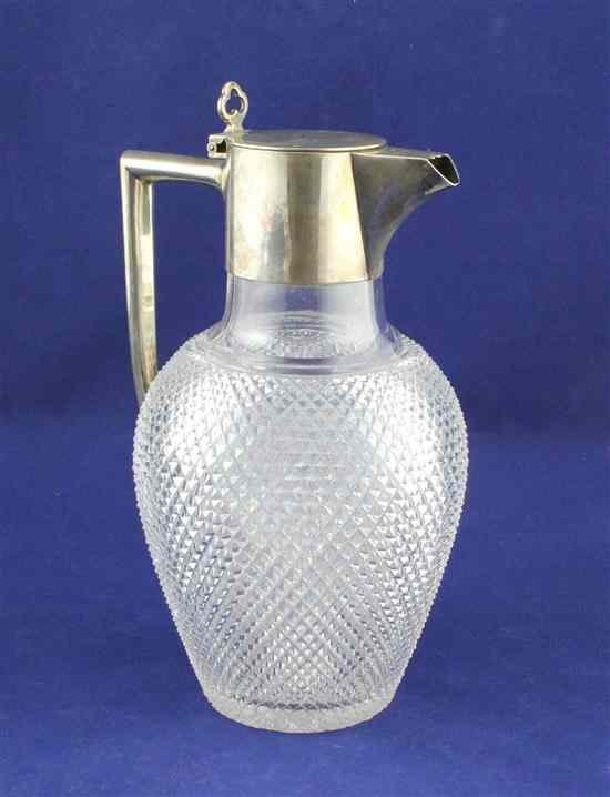 Appraisal: A Victorian silver mounted hobnail cut glass claret jug of