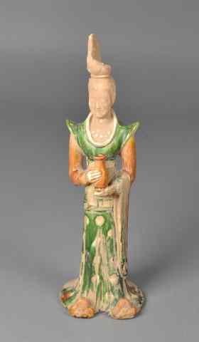 Appraisal: A Chinese Tang Pottery Figure of a LadyMolded to depict