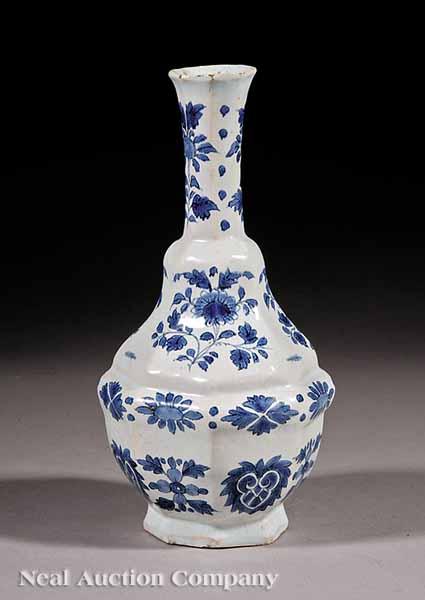 Appraisal: An Antique Tin-Glazed Earthenware Octagonal Vase Delft decorated with blue