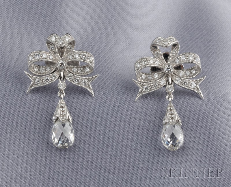 Appraisal: Diamond Earpendants each designed as a full-cut diamond melee bow