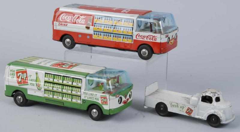 Appraisal: Lot of Assorted Toy Trucks for up Coca-Cola Description s