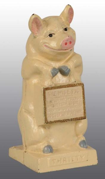 Appraisal: Cast Iron The Wise Pig Still Bank Description Manufactured by