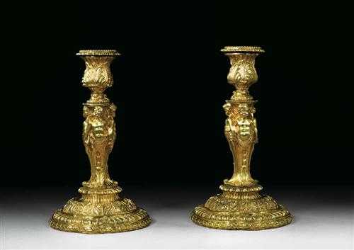 Appraisal: PAIR OF CANDLE HOLDERS AUX ENFANTS late Louis XV Paris