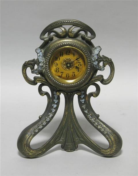 Appraisal: AMERICAN ART NOUVEAU MANTEL CLOCK The circular clock face within