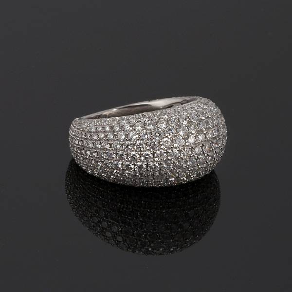 Appraisal: A diamond ring Odelia pav -set with round brilliant-cut diamonds