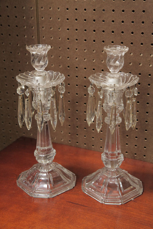 Appraisal: PAIR OF BACCARAT CANDLESTICKS Having cut prisms and swirled sockets