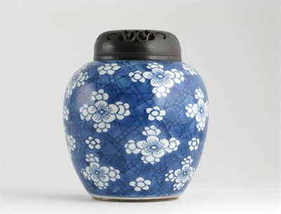 Appraisal: A Chinese blue and white ovoid vase with a wood