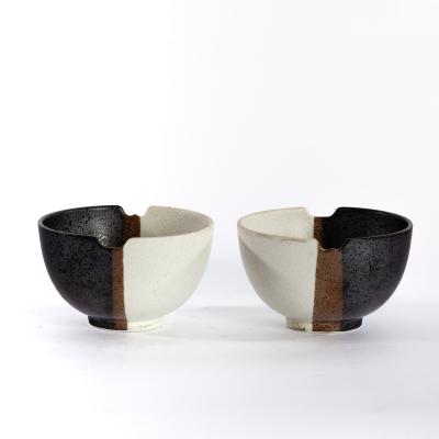 Appraisal: th Century a pair of modern stoneware bowls each with