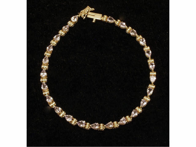 Appraisal: aLadies karat yellow gold bracelet set with pear shape tanzanite