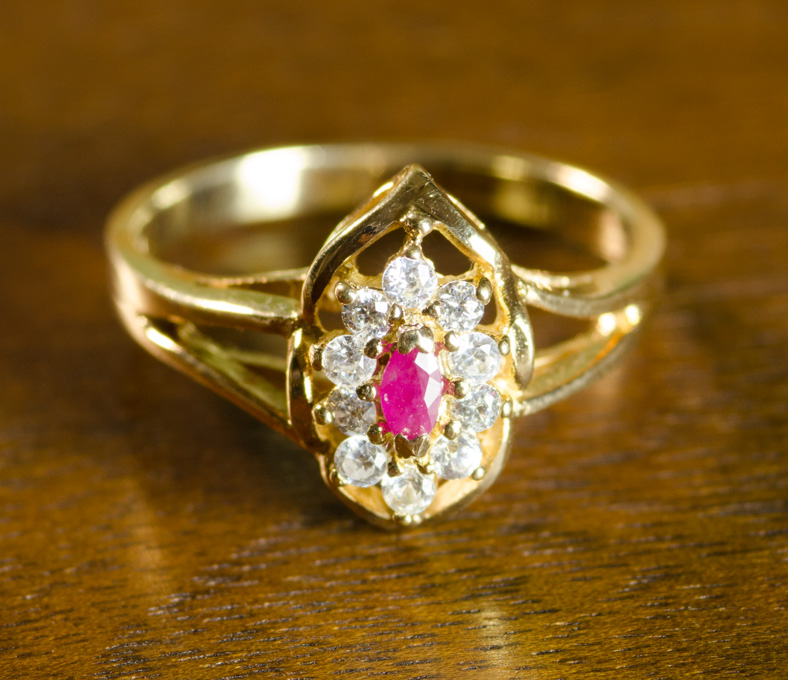 Appraisal: RUBY DIAMOND AND FOURTEEN KARAT GOLD RING with ten round-cut