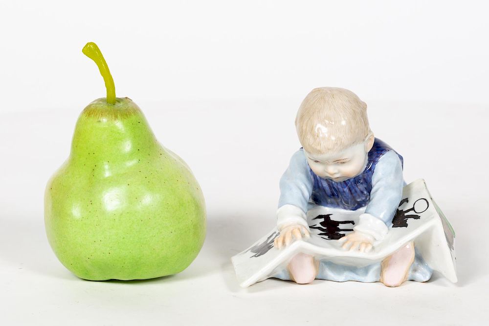 Appraisal: Meissen Baby Reading Porcelain Figurine Marked th century Meissen German