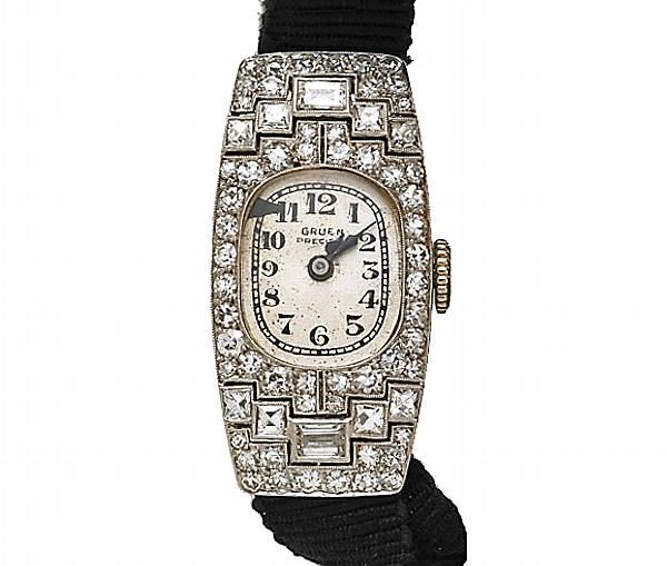 Appraisal: A Gruen lady's diamond and platinum wristwatch estimated total diamond