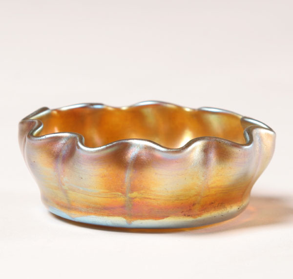 Appraisal: Tiffany gold favrile art glass salt with scalloped rim Engraved