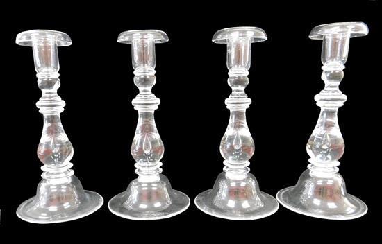 Appraisal: Two pairs th C Steuben clear glass candlesticks each with